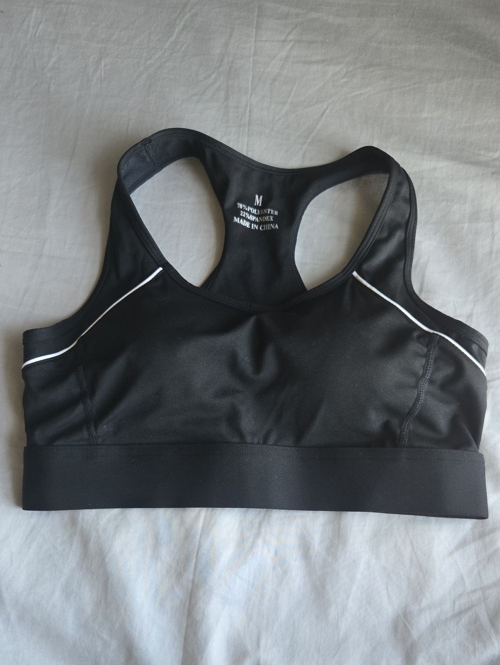 NWOT Black Racerback Sports Bra with Contrast Piping
